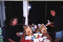 Marking the gingerbread house with Zoey & her mom Sheila Jones (in picture)